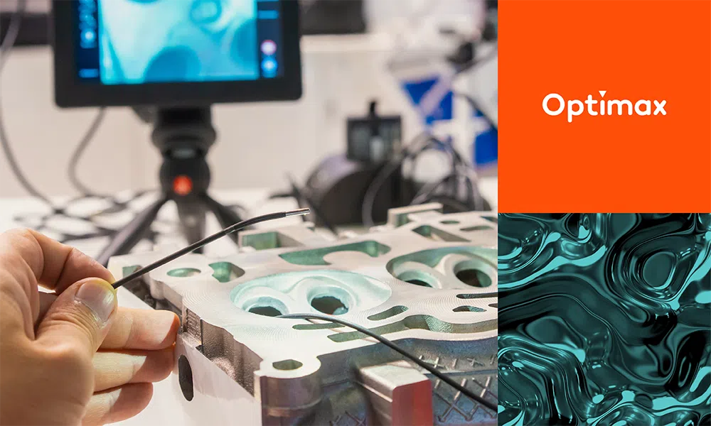 person using a very thin borescope with the Optimax logo in the top right and a microscopic image in the bottom right